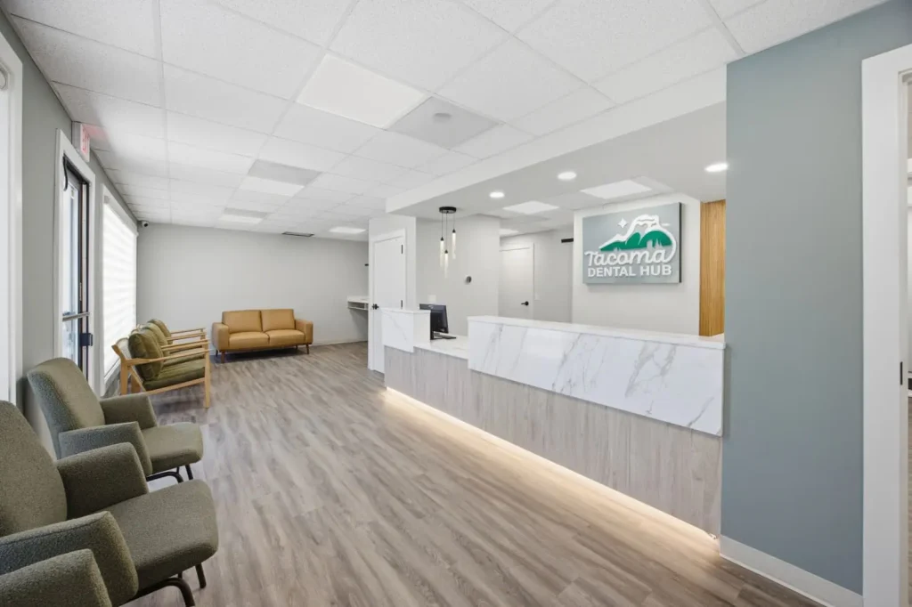 Comfortable patient waiting area with modern seating at Tacoma Dental Hub.